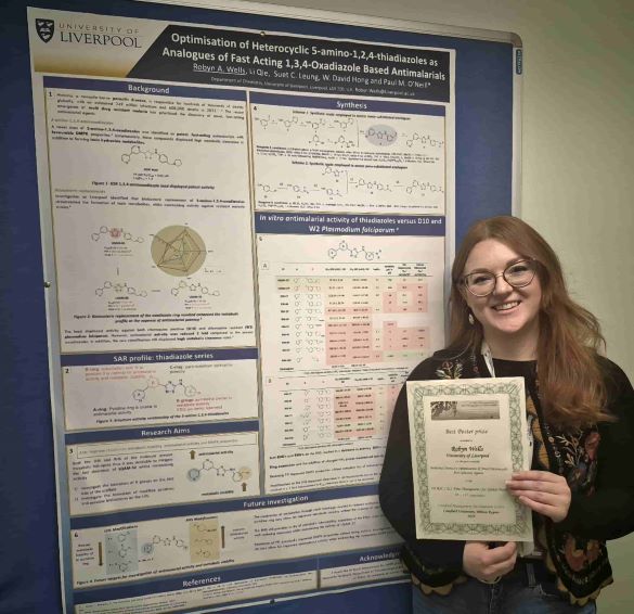 Student in front of poster